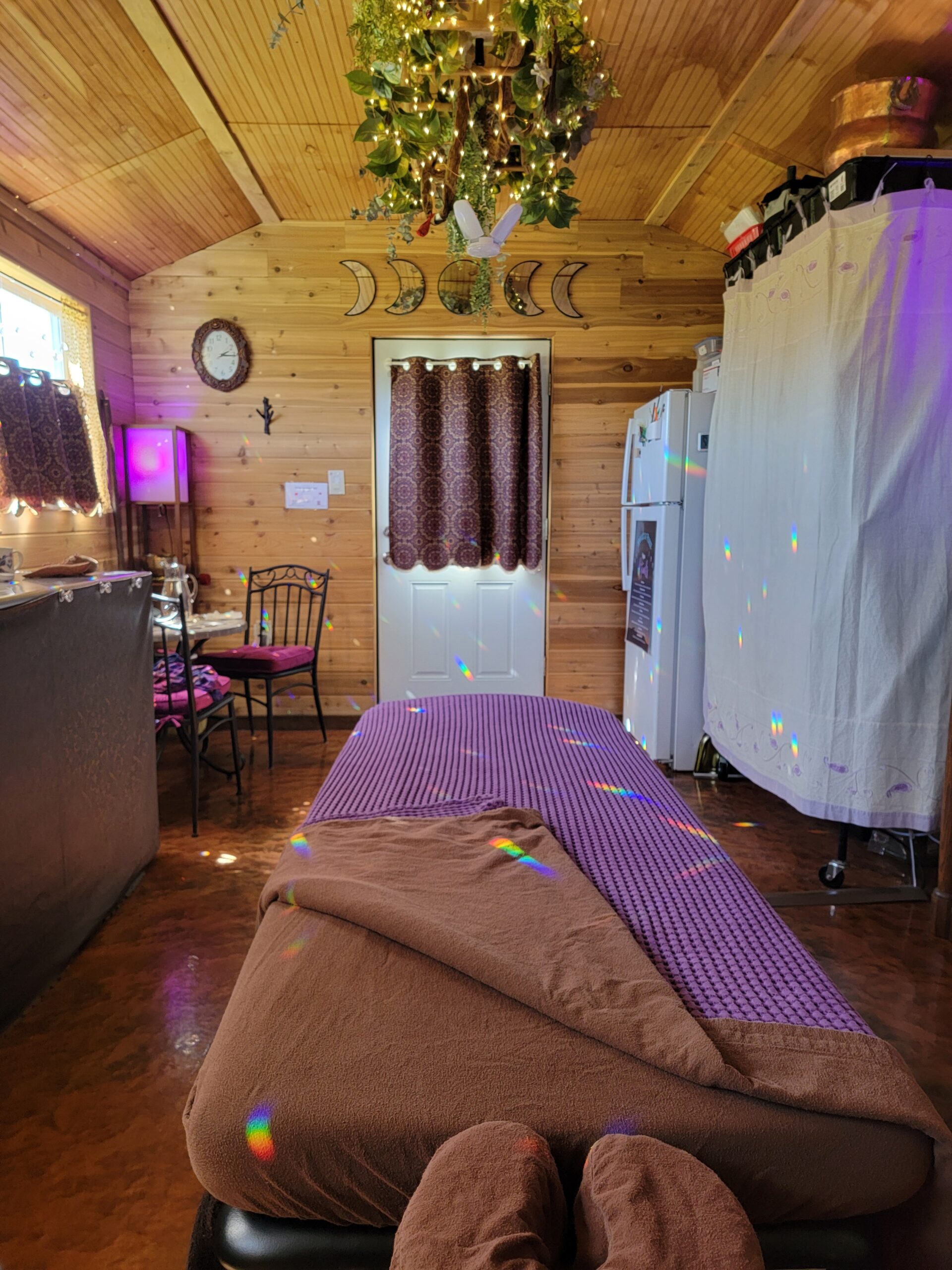 Harvest of Peace Massage Studio with healing rainbow light